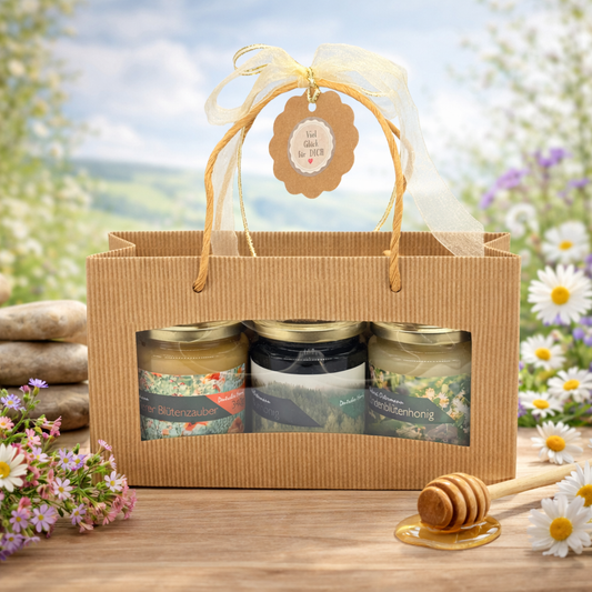 Honig-Dreierlei Geschenkset der Imkerei Ostermann mit drei 340g Gläsern Imkerhonig in einer nachhaltigen Kartonverpackung